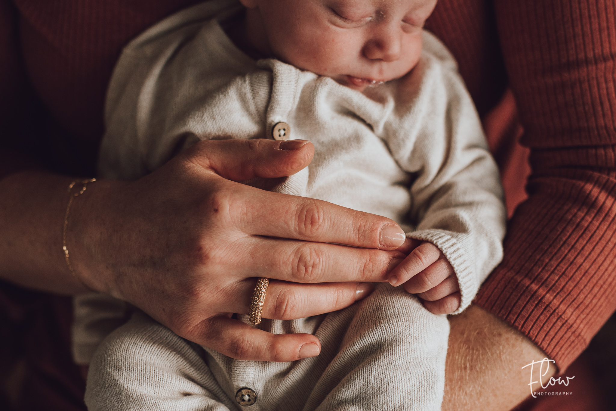 Portfolio foto Newborn baby in armen van moeder
